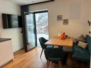 Posedenie v ubytovaní Appartements Pedescin