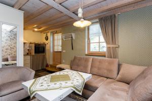 TV a/nebo společenská místnost v ubytování Family apartament
