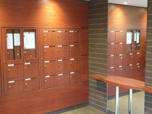 a row of lockers in a locker room at Studio proche rer e in Rosny-sous-Bois