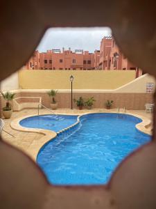 Bazén v ubytovaní Apartament Casa Milo playa Los Locos alebo v jeho blízkosti