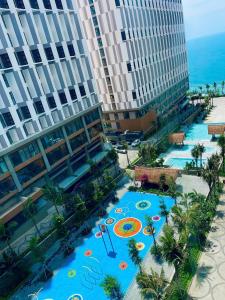 an aerial view of a resort with a pool at Apec Mandala Mui Ne Phan Thiet in Ấp Long Sơn