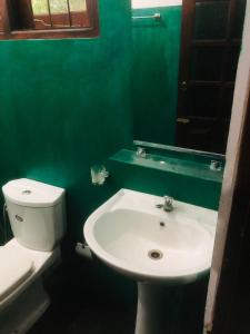 Kúpeľňa v ubytovaní Laughing Jungle Unawatuna