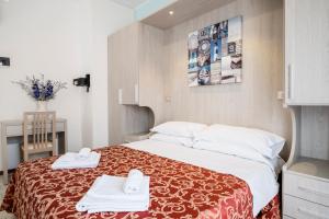 Postel nebo postele na pokoji v ubytování Hotel Belmar