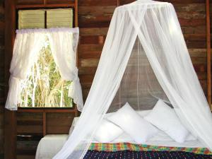 Katil atau katil-katil dalam bilik di Foresta Cottage of Koh Pu no6196