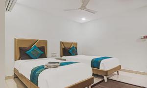 Postel nebo postele na pokoji v ubytování Hotel SSR GRAND