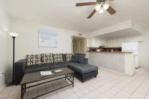 a living room with a couch and a table at Lovely 2 Bed 2 Bath 2nd Floor Condo By Beach in South Padre Island