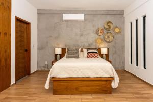 Voodi või voodid majutusasutuse Casa Bonita Playa del Carmen toas +16 fotot