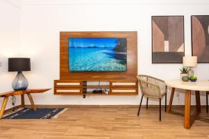 Televiisor ja/või meelelahutuskeskus majutusasutuses Casa Bonita Playa del Carmen