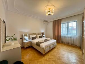 Postel nebo postele na pokoji v ubytování MANSION HOTEL YEREVAN