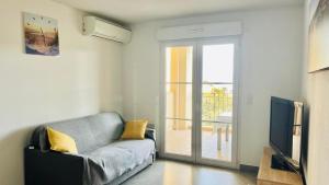 Posezení v ubytování Appartement Les Oliviers L'ILE ROUSSE