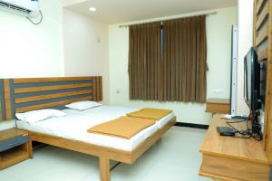 Katil atau katil-katil dalam bilik di Hotel Anjani