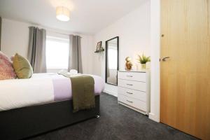 Postel nebo postele na pokoji v ubytování Cohost Partners | Free Parking | 2BR | Smart TV