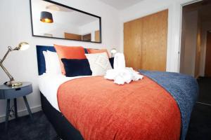 Postel nebo postele na pokoji v ubytování Cohost Partners | Free Parking | 2BR | Smart TV + 25 fotografií