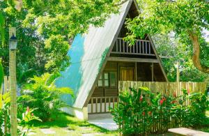 Um jardim em Pousada Ecologica Bangalo de Praia