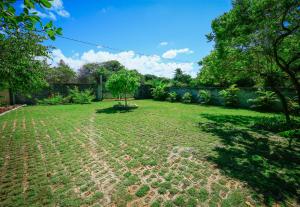 Um jardim em Pousada Ecologica Bangalo de Praia