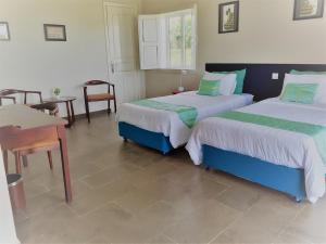 Ένα ή περισσότερα κρεβάτια σε δωμάτιο στο Koh Ker Temples Garden Hotel and Restaurant