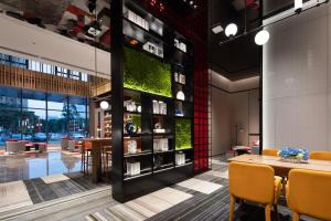 Area soggiorno di Hampton by Hilton Guigang