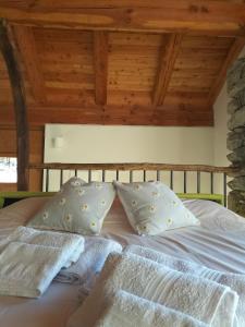 Кровать или кровати в номере Baita del noce
