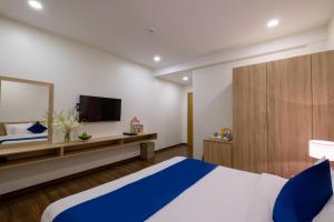 Postel nebo postele na pokoji v ubytování Sandals Star Hotel