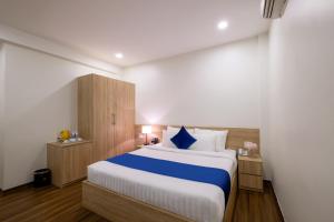 Postel nebo postele na pokoji v ubytování Sandals Star Hotel