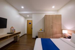 Postel nebo postele na pokoji v ubytování Sandals Star Hotel