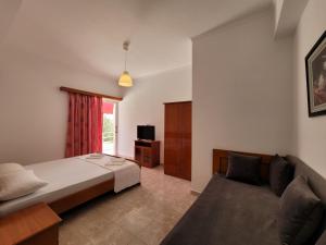 Postel nebo postele na pokoji v ubytování City Center Gjordeni Apartments