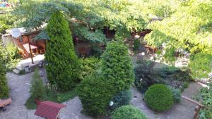 an overhead view of a garden with trees and bushes at Hotel Zara Rooms in Stara Zagora