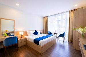 Postel nebo postele na pokoji v ubytování Sandals Star Hotel