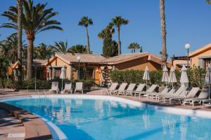 The swimming pool at or close to Maspalomas Resort by Dunas