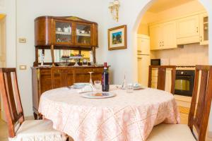 a kitchen with a table with a plate on it at Dimora Iride in Monopoli