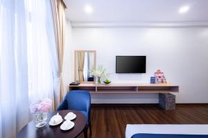 TV a/nebo společenská místnost v ubytování Sandals Star Hotel