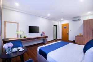 TV a/nebo společenská místnost v ubytování Sandals Star Hotel