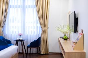 TV a/nebo společenská místnost v ubytování Sandals Star Hotel