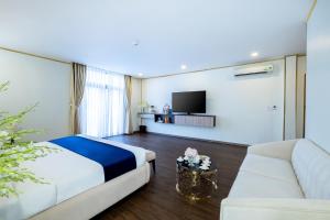 TV a/nebo společenská místnost v ubytování Sandals Star Hotel