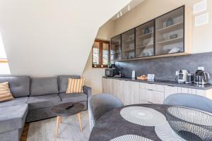 Kuchyňa alebo kuchynka v ubytovaní Green Park Resort D28- z dostępem do basenu, sauny, jacuzzi, siłowni