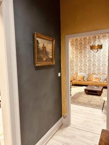 Łóżko lub łóżka w pokoju w obiekcie LA MARIEFACTURE - Comme une Forteresse