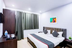 Posteľ alebo postele v izbe v ubytovaní Family Rooms Inn - Shalimarbagh