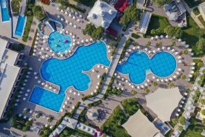 an overhead view of a resort with two pools at Swandor Hotels & Resorts - Topkapi Palace in Lara