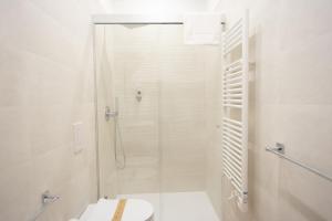 Ванна кімната в Dimora Amelia Luxury Apartments