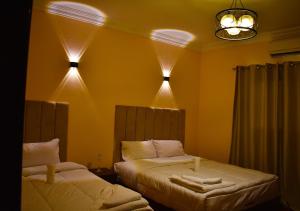 Letto o letti in una camera di King Badr pyramids