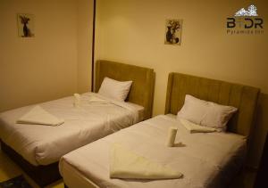 Letto o letti in una camera di King Badr pyramids