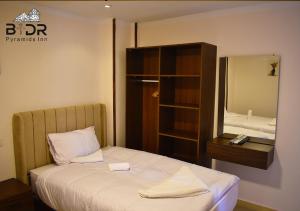 Letto o letti in una camera di King Badr pyramids