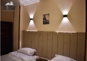 Letto o letti in una camera di King Badr pyramids