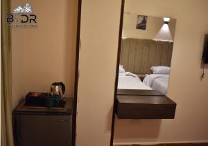 Letto o letti in una camera di King Badr pyramids