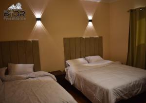 Letto o letti in una camera di King Badr pyramids