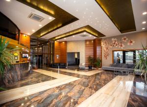 a lobby of a hotel with a reception desk at KONAK PARK HOTEL in Trabzon