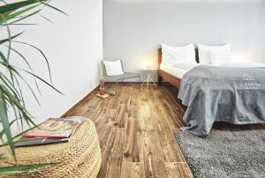Postel nebo postele na pokoji v ubytování U JOSÍFKA