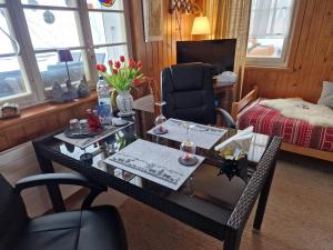 Posezení v ubytování Chalet Gotthelf Gartenstudio, Ferien mit Hund