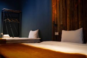 Llit o llits en una habitació de Hotel Misty Mountain