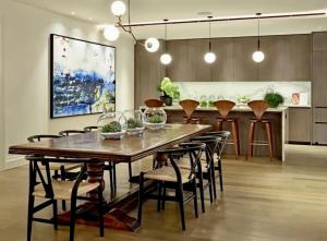 a dining room with a large wooden table and chairs at Royal Luxury 3 Beds: Central Covent Garden Haven in London